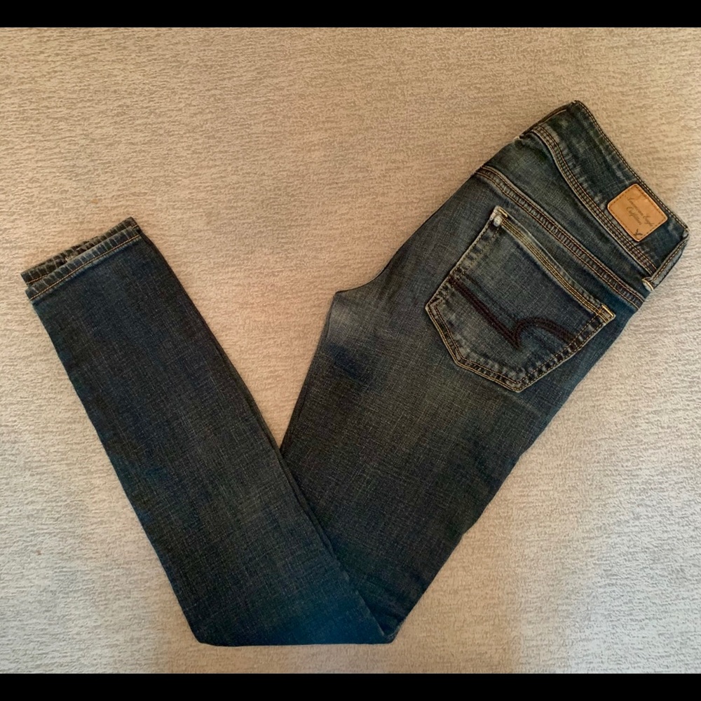American Eagle dark wash skinny jeans.